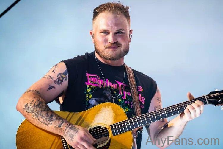 Zach Bryan Stops Concert After Fan Throws Object on Stage: ‘Don’t Throw S–t!’